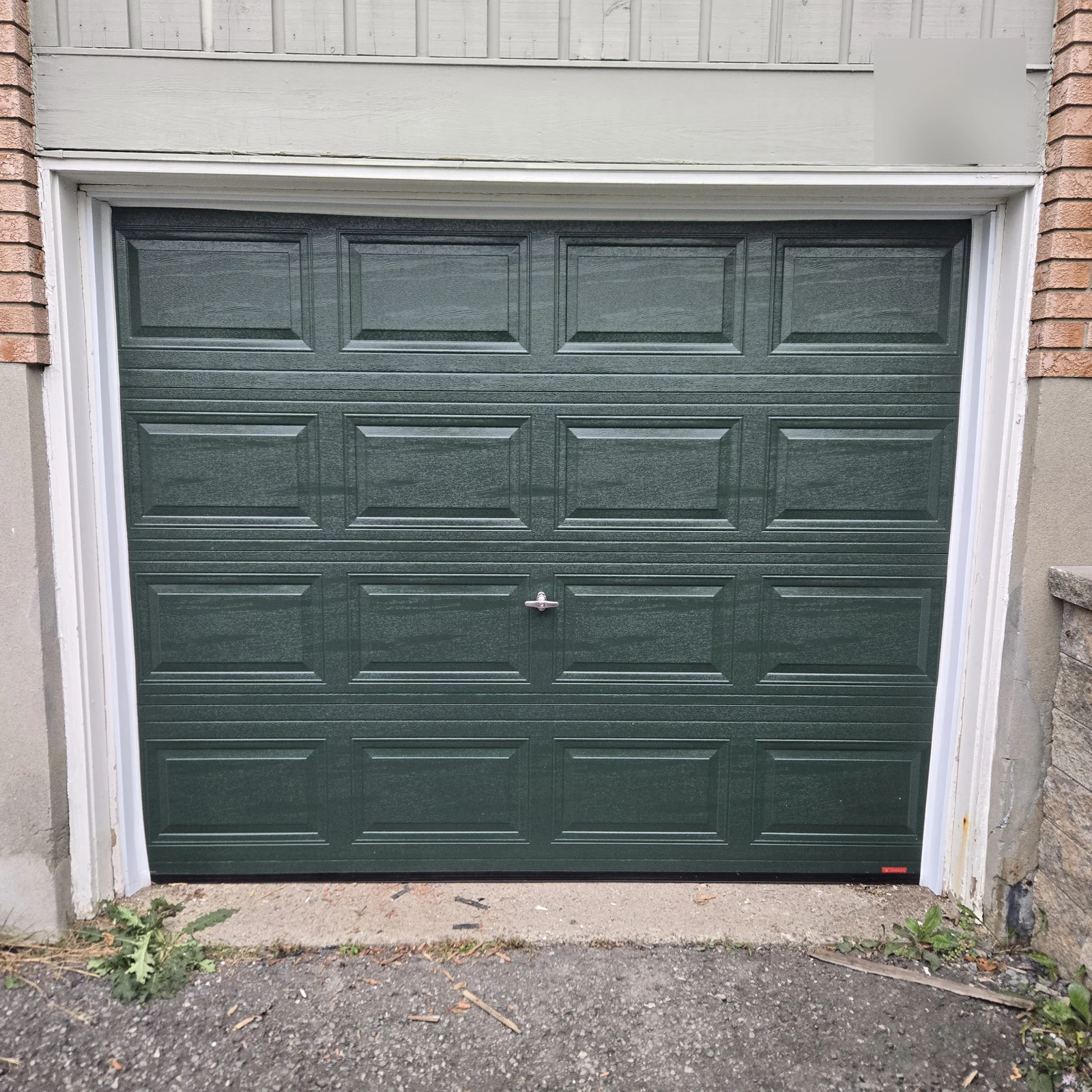 Classic 300 raised-panel garage door in Evergreen.